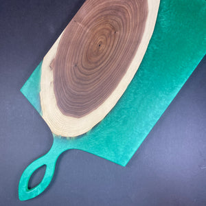 Beautiful walnut cookie and green epoxy cheese board with unique handle design