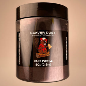 large container of pigment labeled with a beaver logo sitting on a logr 