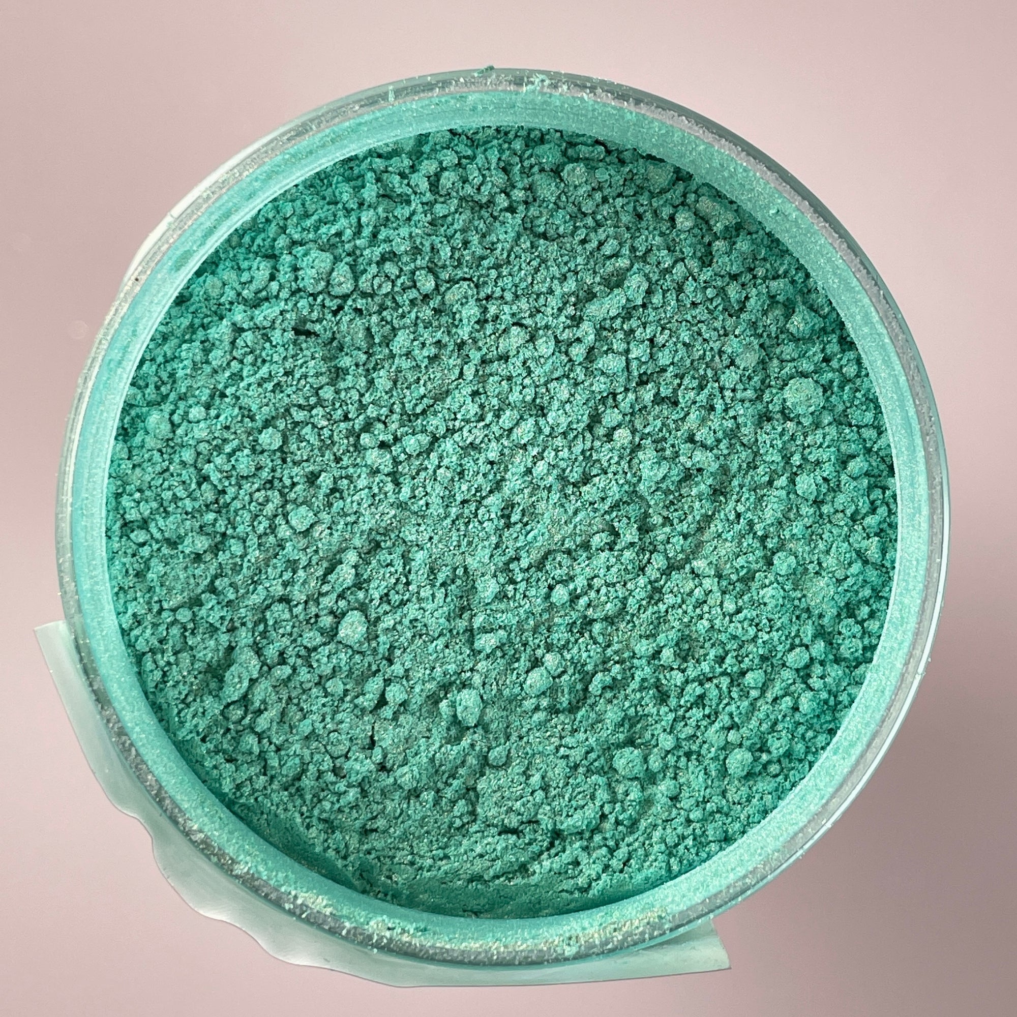 Iridescent mica powder for creating unique color effects to give a green tone