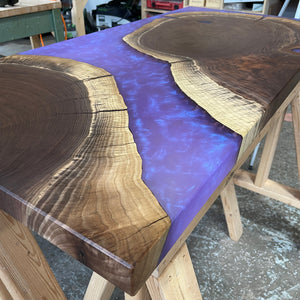 Resin and walnut wood combo table example showing purple colour shift resin pigment