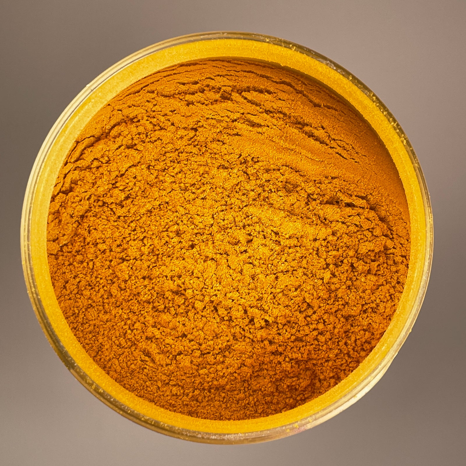 gold colour that looks like it has been rusted and aged